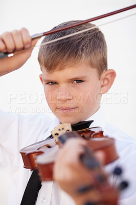 Buy stock photo Boy, portrait or violin bow or music lesson, musician talent or learning skill practice. Male person, school child or white background or instrument hobby education or concert, orchestra or listening