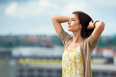 Buy stock photo Woman, relax and freedom on rooftop for peace, adventure and freedom on trip to Norway, cityscape and sky. Female person, vacation and happy or positive for getaway, zen and break on holiday outdoors