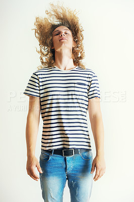Buy stock photo Young man with curly long hair head-banging