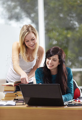 Buy stock photo Creative, team and business women on a laptop in office for planning, teamwork and strategy. Coaching, mentor and happy female colleagues online for feedback, review and advice for proposal plan