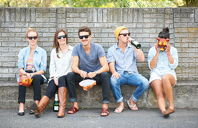 Buy stock photo Social, portrait and friends on a bench in public for drinks, conversation and bonding on the weekend. Happy, group and people in the city for alcohol, communication and together for society