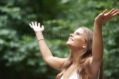 Buy stock photo Smile, freedom and a woman arms raised in the countryside for mental health, wellness or zen meditation. Summer, nature and a young person in the forest to relax for mindfulness or inner peace