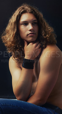 Buy stock photo Man, shirtless and beauty with hair in studio, curls and shine with model on dark background. Young, fit and gen z, muscle and skin with cosmetics, hipster casual and calm with curly hairstyle