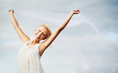 Buy stock photo Portrait, happy and woman with chiffon in wind outdoor for summer, vacation or travel on holiday. Face, smile and dress or fabric fly for freedom, beauty and elegant, fashion or glamour on blue sky