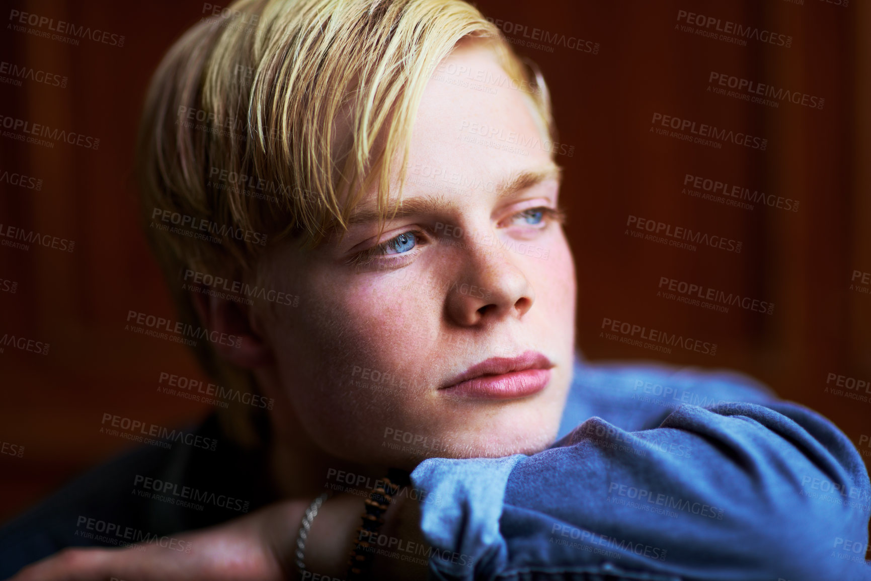 Buy stock photo Thoughtful and handsome young blonde guy with very blue eyes