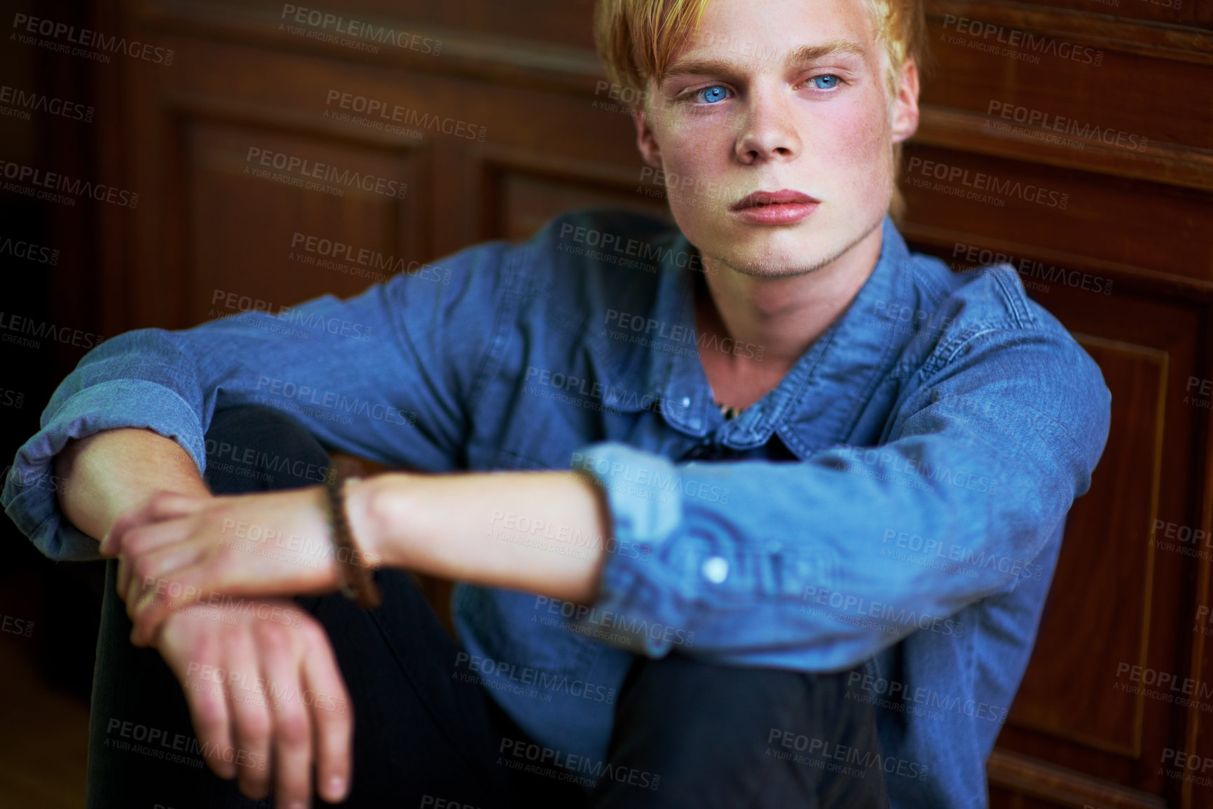 Buy stock photo Thoughtful and handsome young blonde guy with very blue eyes