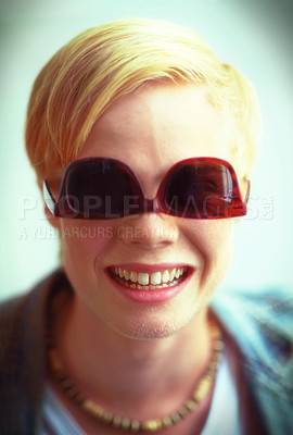Buy stock photo Goofy, cool and portrait of a man with sunglasses for fashion, streetwear and a teen trend. Happy, funny and face or a person with trendy, stylish or fashionable eyewear, funky cap or shades
