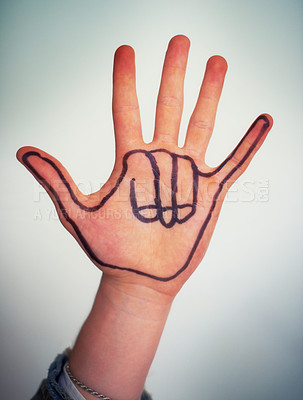 Buy stock photo Cropped view of a male hand with a Hawaiian "shaka" gesture drawn on it