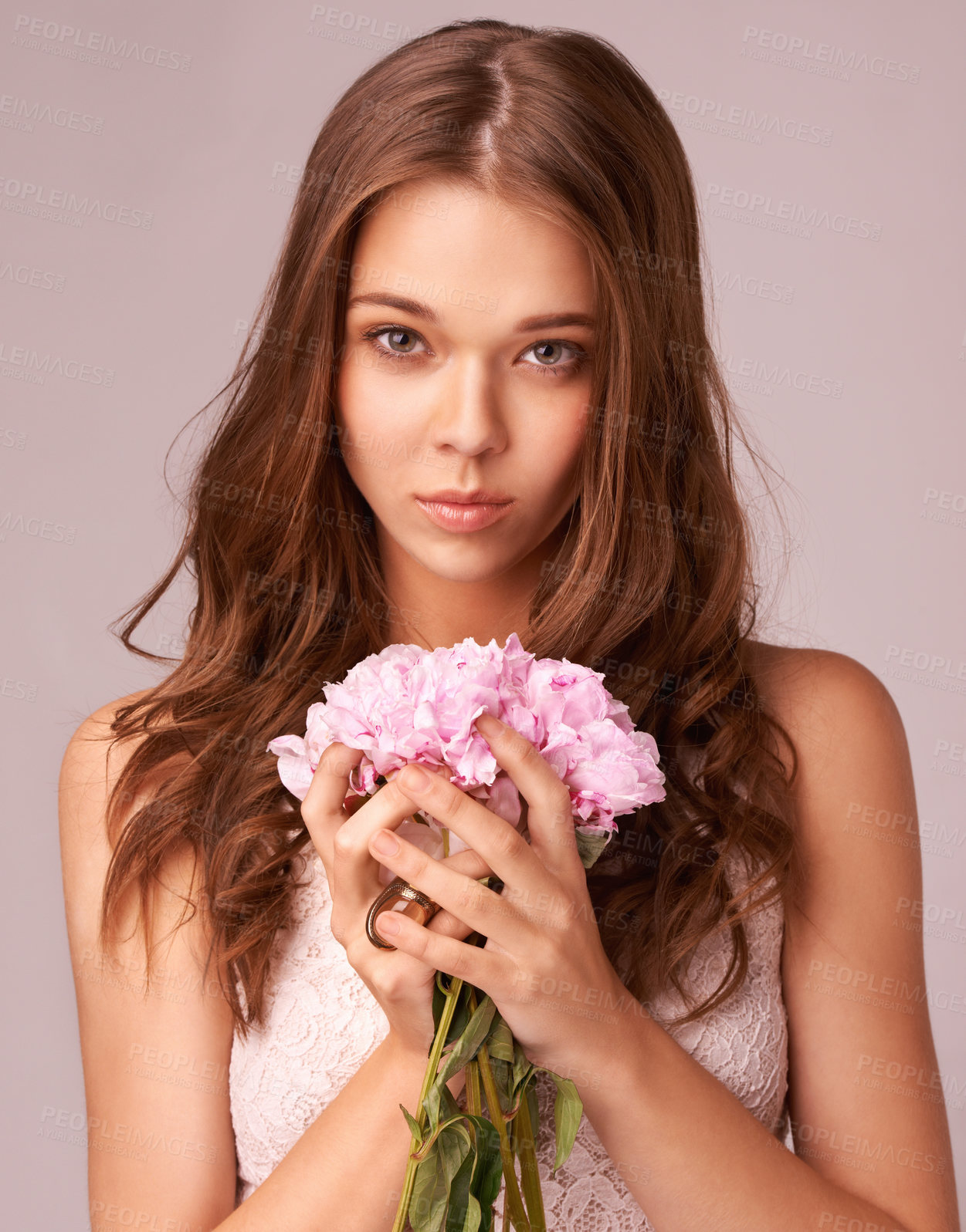 Buy stock photo Woman, portrait and bouquet for wellness in studio, beauty and skincare for care, elegant and cosmetic. Female model person, flowers and hands for spa treatment, organic body care and background