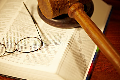 Buy stock photo An open book with a gavel and block  - justice