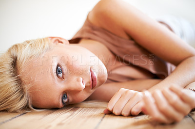 Buy stock photo Shot of a gorgeous young woman relaxing at home