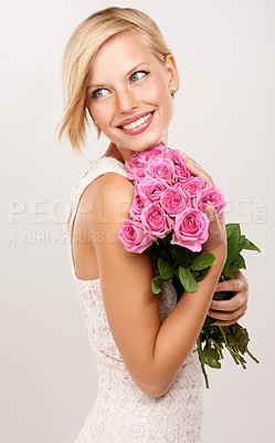 Buy stock photo Flowers, bouquet and smile with woman in studio for floral, valentines day and romance. Plants, gift and happy with female person and pink roses on white background for elegant, love and present 