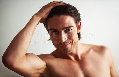 Buy stock photo Topless, relax or portrait of happy man on wall for fitness workout, training or exercise on white background. Bodybuilder, smile or handsome person with healthy body or natural muscle for wellness