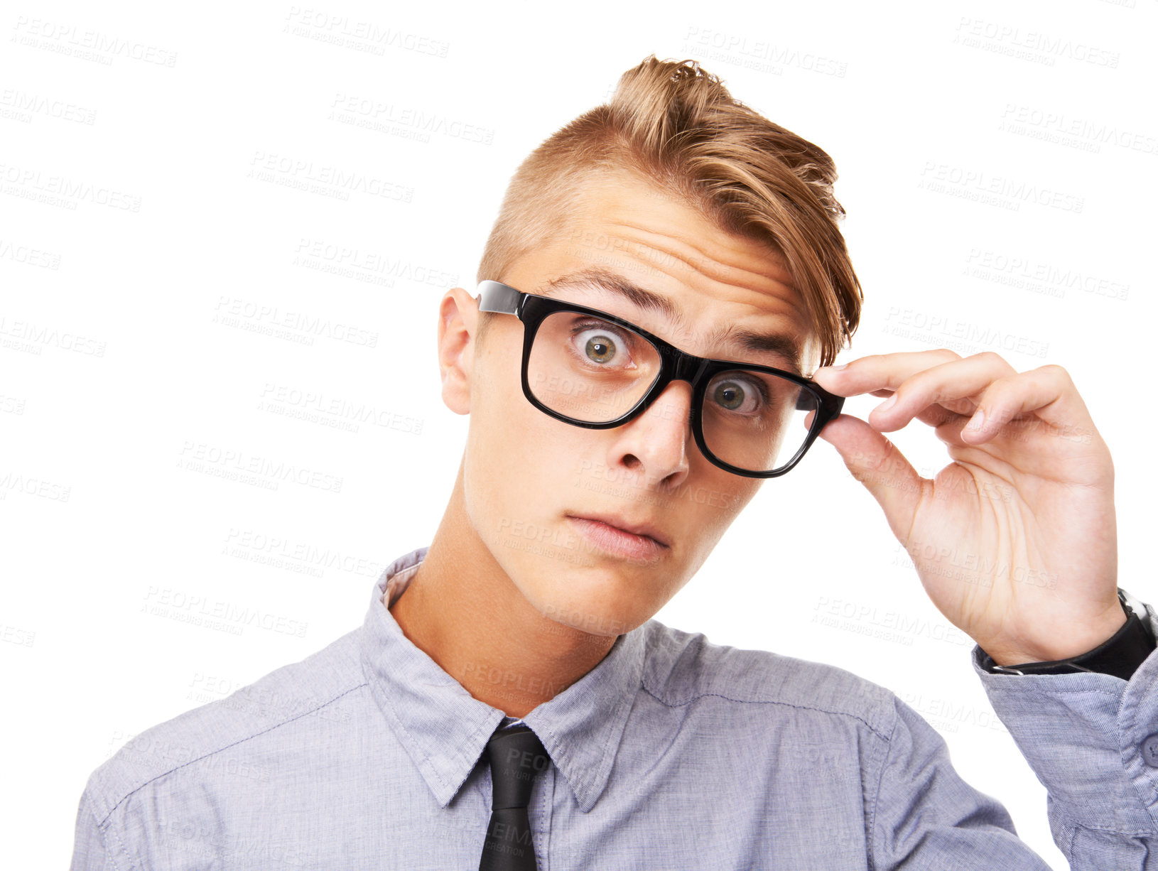 Buy stock photo Studio portrait of an expressive young man wearing glasses isolated on white