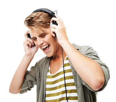 Buy stock photo Cropped shot of a young man listening to music