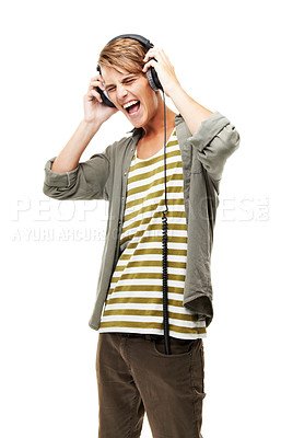Buy stock photo Singing, music and man with headphones in studio white background streaming audio online. Radio, sound and person screaming and listening to rock, metal or hip hop track on technology with energy