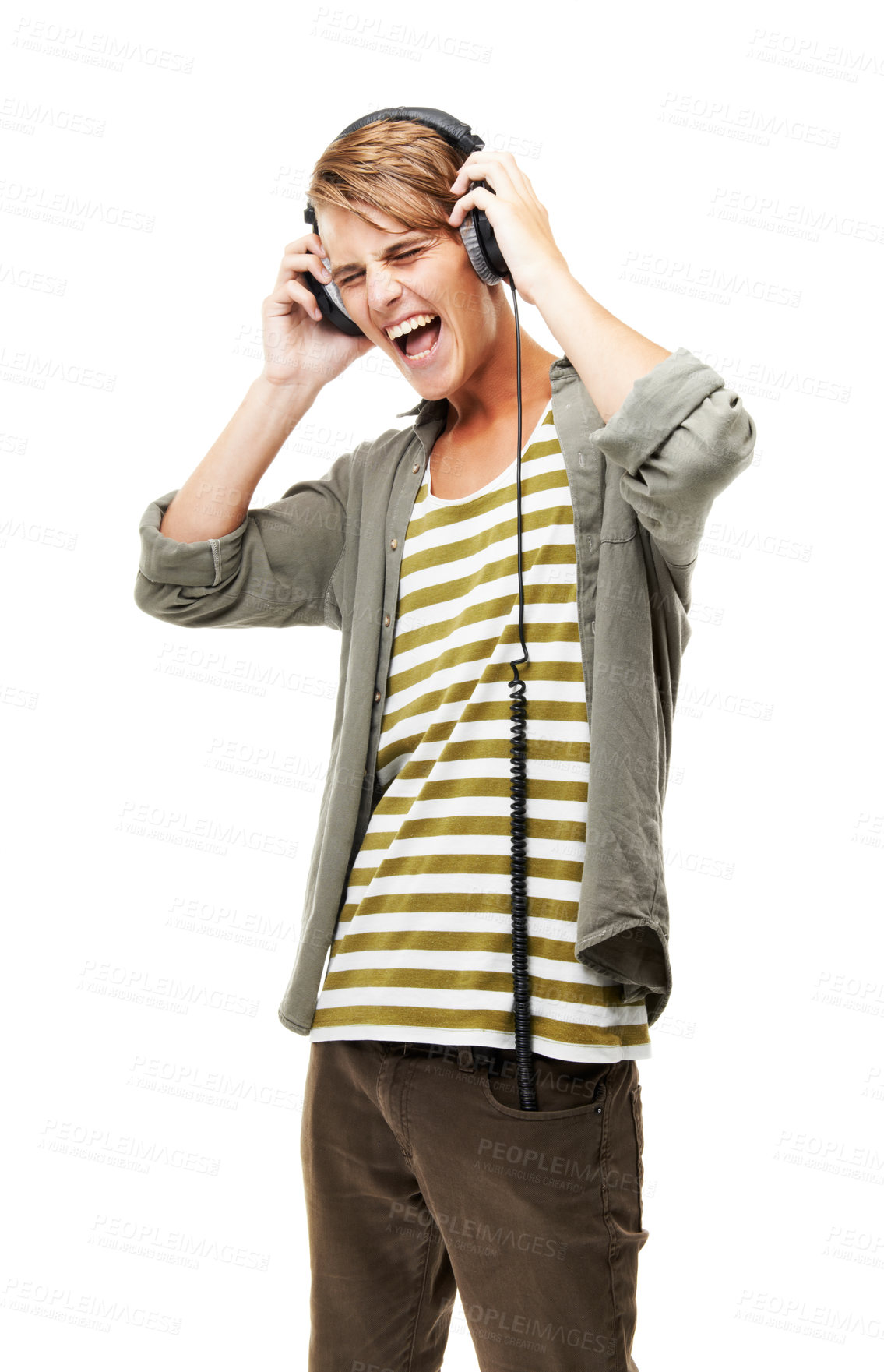 Buy stock photo Singing, music and man with headphones in studio white background streaming audio online. Radio, sound and person screaming and listening to rock, metal or hip hop track on technology with energy