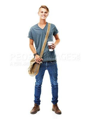 Buy stock photo A full length studio shot of a young man carying a messenger's bag and holding a cup of coffee isolated on white