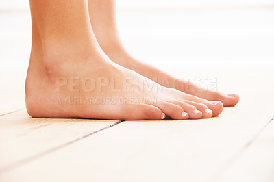 Buy stock photo Close-up of feet on a wooden floor