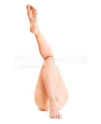 Buy stock photo Skincare, shaving and legs of person on a white background for grooming, hygiene and wellness. Dermatology, salon aesthetic and isolated body in studio for hair removal, epilation and smooth skin