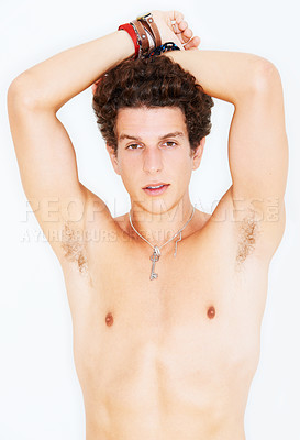 Buy stock photo Portrait, skin and the body of a man in studio isolated on a white background for natural masculinity. Fitness, health and wellness with a shirtless young model looking confident at his bare physique
