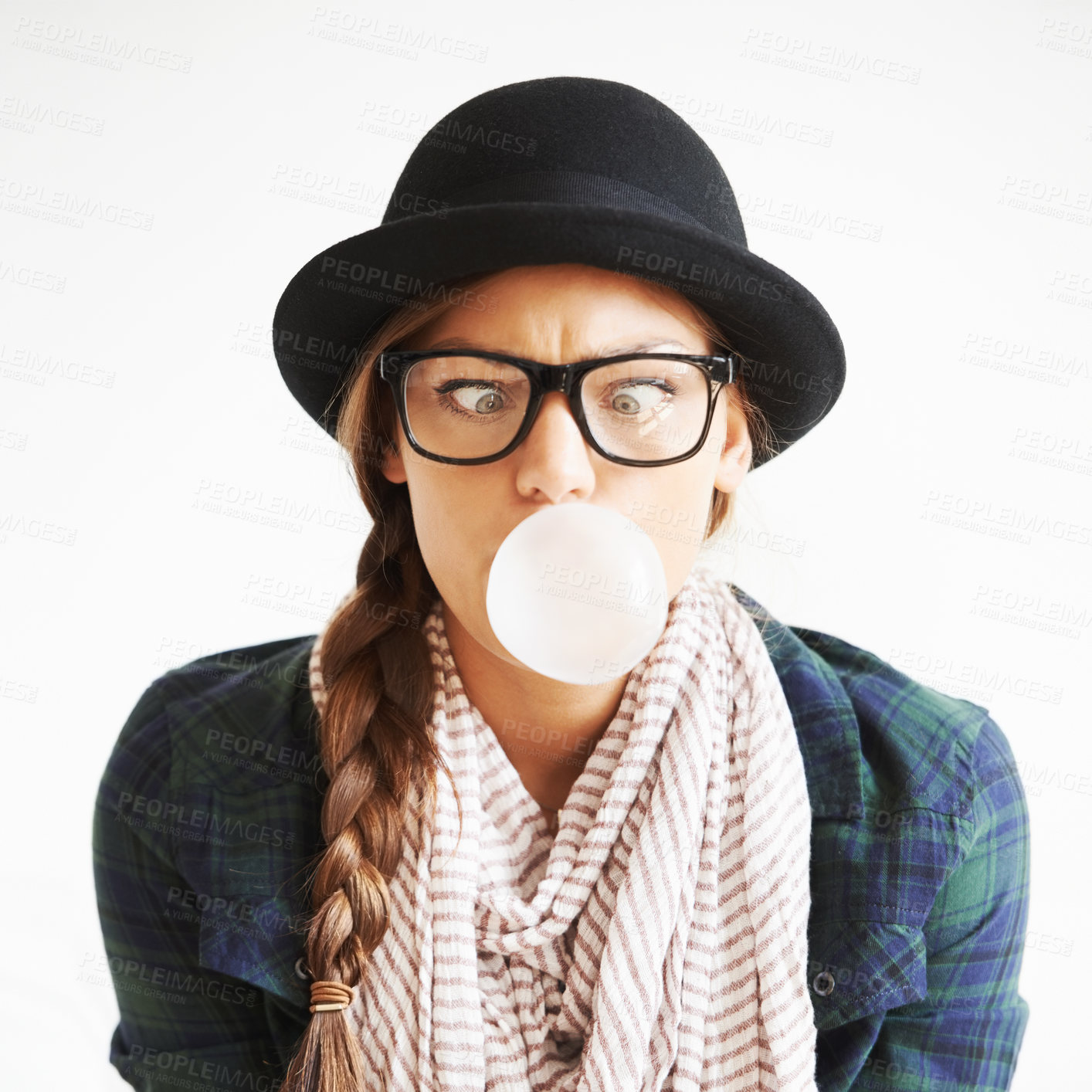 Buy stock photo Cool, gum and a woman blowing a bubble for comedy, funny and crazy on a white background. Comic, stylish and a goofy young girl with bubblegum, weird face and quirky on a studio backdrop with glasses