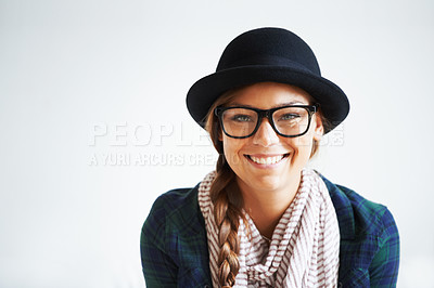 Buy stock photo A young woman smiling at the camera against a white background