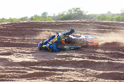 Buy stock photo Sand, accident and motorbike for sports with action for challenge or competition with power. Speed, mistake and desert with bike for race or adventure in outdoor with freedom or fearless driving.