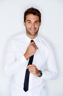 Buy stock photo Portrait, smile for fashion with a man in a shirt and tie in studio on a gray background for chic style. Business, getting ready or dressing with a happy young model in trendy clothes for work