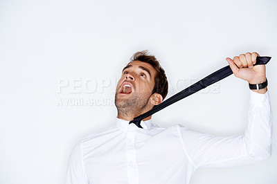 Buy stock photo Stress, choke and tie with a business man in studio on a white background to fear or strangle. Depression, anxiety or mental health and a shouting young model choking his neck with a tight grip