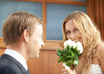 Buy stock photo Couple, flowers and woman with smile in valentines day, relationship or celebration for date. Happy female holding white roses, bouquet or gift from boyfriend for anniversary or special month of love