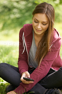 Buy stock photo Woman in park with phone, social media at university, internet connection and website for school. Relax, smartphone and college student on grass in campus garden for research, mobile app and smile.
