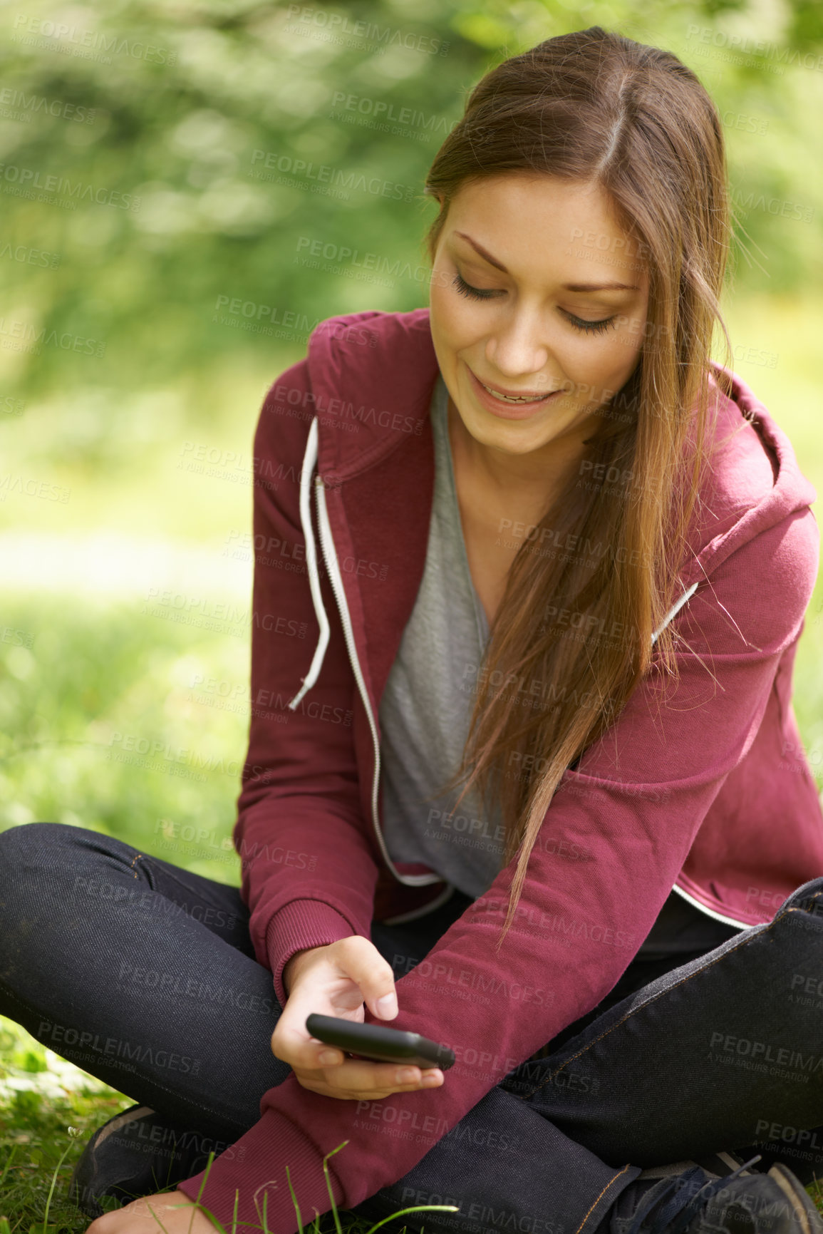 Buy stock photo Woman in park with phone, social media at university, internet connection and website for school. Relax, smartphone and college student on grass in campus garden for research, mobile app and smile.
