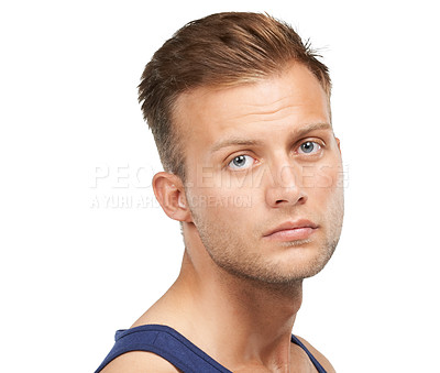 Buy stock photo Portrait, beauty and blue eyes with a man in studio isolated on a white background for aesthetic wellness. Face, skincare and natural with a confident young model looking confident or masculine