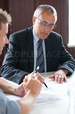 Buy stock photo Planning, businessmen with paperwork and in a business meeting together in a boardroom. Finance support or consulting, collaboration or teamwork and colleagues discussing in a modern workplace office