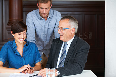 Buy stock photo Business meeting, men and woman with planning, strategy or brainstorming with partnership, collaboration or documents. Employees, people and discussion in office at workplace or company with smile