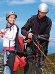 Strapping themselves together for a tandem jump