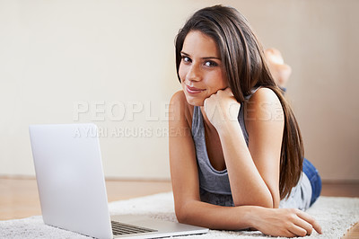 Buy stock photo Floor, laptop or portrait of student in e learning, online education or typing for university at home. Remote work, relax or woman on computer to research information or report on a college website