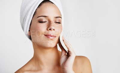 Buy stock photo Woman, face and cotton pad for skincare or beauty, exfoliating and cosmetics or treatment. Female model person, relax and facial or self care, wellness and white background in studio or mockup