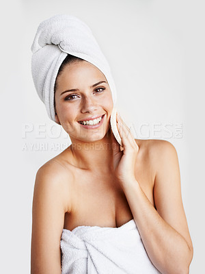 Buy stock photo Woman, smile and cotton pad for beauty, exfoliating and cosmetics or treatment. Female model person, happy and facial or self care, wellness and white background in studio, mockup and skincare