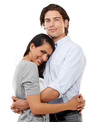 Buy stock photo Happy, love and couple hugging in studio for intimacy, affection and care for anniversary. Happiness, smile and portrait of young man and woman embracing for romance and bonding by a white background