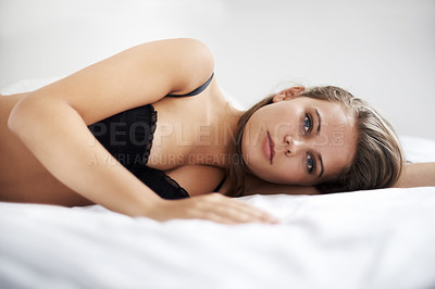 Buy stock photo Bed, relax and portrait of woman in lingerie in her home resting, peaceful and chilling on the weekend. Underwear, face and female person lying in a bedroom with confidence, comfortable or waking up