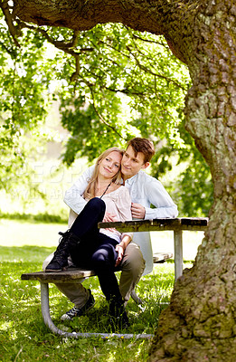 Buy stock photo Park, bench or happy couple hug, love and bonding in outdoor nature, green garden or romantic date. Summer sunshine, tree shade or relax boyfriend, girlfriend or partner embrace for relationship care