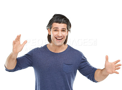 Buy stock photo Studio portrait of a handsome man looking surprised against a white background