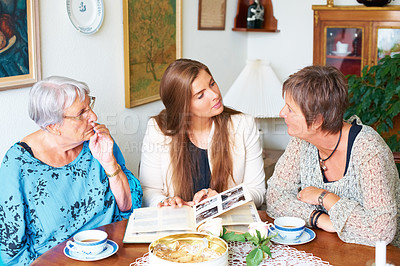 Buy stock photo Shot of a woman sitting with her mother and grandmother