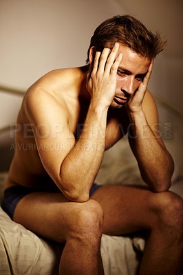 Buy stock photo Home, headache and man with stress, depression and mental health with anxiety, bedroom and tired. Person, apartment and guy with burnout, feeling alone and lonely with insomnia, sadness and fatigue