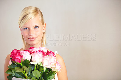 Buy stock photo Portrait, roses and woman in studio for valentines day, gift or thank you gesture on wall background. Face, rose and girl with flowers, plants and relax with floral arrangement and mockup space