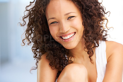 Buy stock photo Naturally gorgeous young woman looking at you with a smile