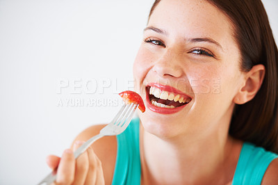 Buy stock photo Health, diet and portrait of woman with strawberry eating for nutrition, wellness or snack in studio. Food, happy and face of person with fruit for vitamins, detox and lose weight on white background