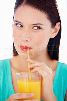 Buy stock photo Health, drink and face of woman with juice for nutrition, wellness and hydration in studio Happy, thirsty and person with fruit blend or beverage for vitamins, detox and diet on white background